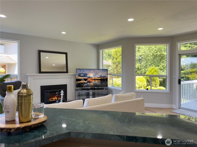 1621 Edgemoor Ln, Everett, WA 98203 - living room with a fireplace, recessed lighting, wood finished floors, and baseboards