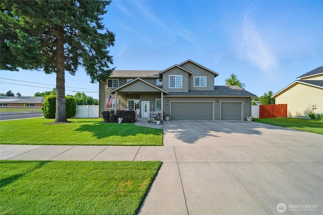 919 Carmella St, Walla Walla, WA 99362 - view of front facade with concrete driveway and an attached garage