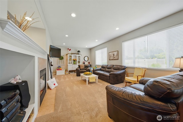 919 Carmella St, Walla Walla, WA 99362 - living room with light carpet, recessed lighting, and a glass covered fireplace