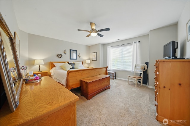 919 Carmella St, Walla Walla, WA 99362 - bedroom with light carpet, baseboards, and a ceiling fan