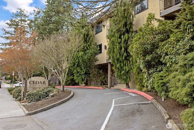 750 N 143rd St Unit 211, Seattle, WA 98133 - surrounding community featuring uncovered parking
