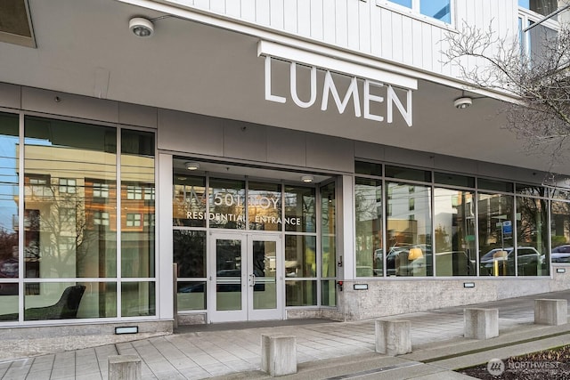 501 Roy St Unit T308, Seattle, WA 98109 - view of exterior entry featuring french doors and a security system