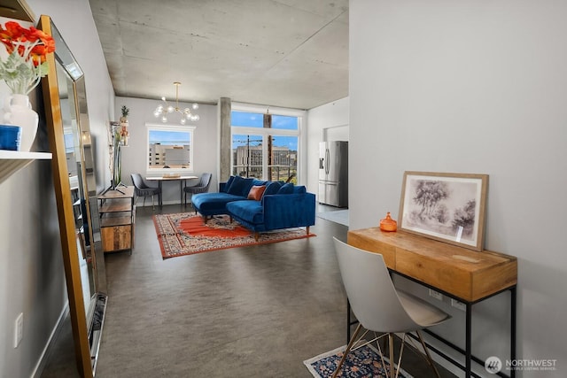 501 Roy St Unit T308, Seattle, WA 98109 - living room with a chandelier and finished concrete flooring