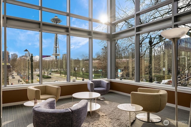 501 Roy St Unit T308, Seattle, WA 98109 - sunroom with baseboards and carpet