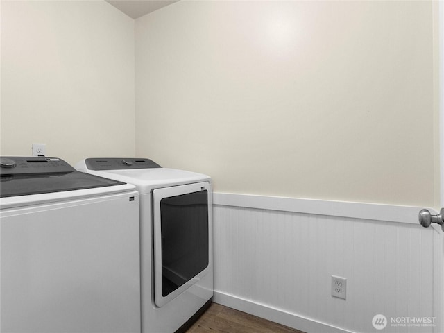 7600 Brianna Ct SE, Olympia, WA 98513 - washroom with washer and clothes dryer, a wainscoted wall, and dark wood-style floors