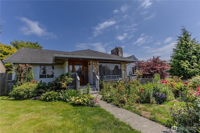 1035 Oakes Ave, Everett, WA 98201 - bungalow-style home with a chimney, stone siding, and a porch