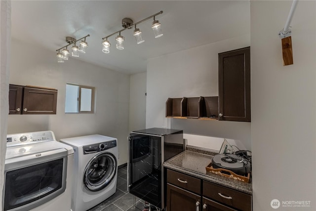 1035 Oakes Ave, Everett, WA 98201 - washroom featuring washing machine and clothes dryer, beverage cooler, and cabinet space