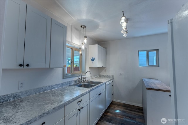 1035 Oakes Ave, Everett, WA 98201 - kitchen with a sink, healthy amount of natural light, dark wood finished floors, and white cabinetry