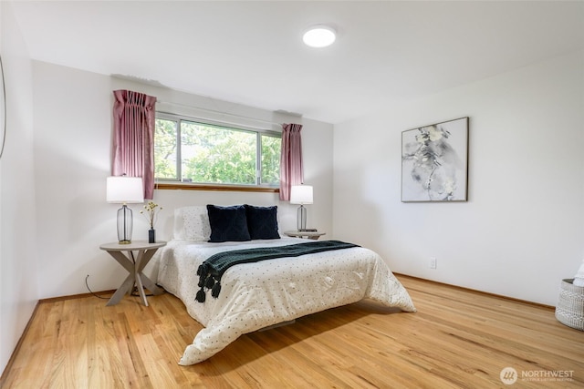17618 Meridian Ave N, Shoreline, WA 98133 - bedroom with wood finished floors and baseboards