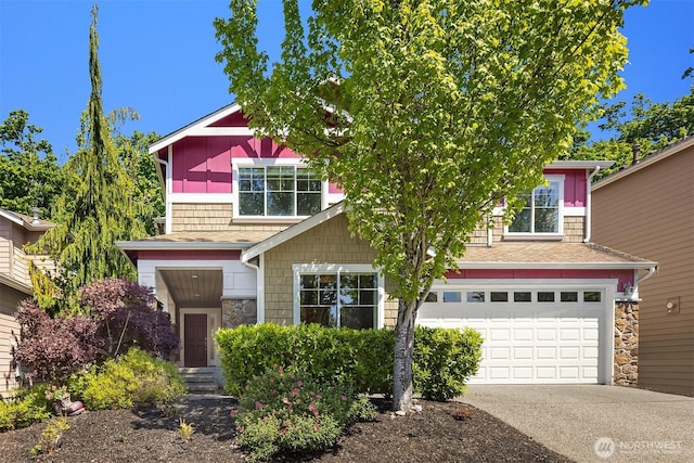 16148 Parkside Way SE, Renton, WA 98058 - view of front of home featuring stone siding, driveway, and a garage