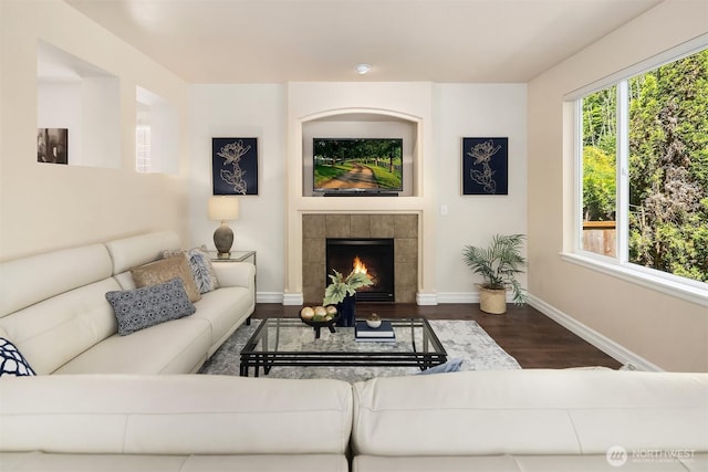 16148 Parkside Way SE, Renton, WA 98058 - living room featuring dark wood finished floors, baseboards, and a fireplace