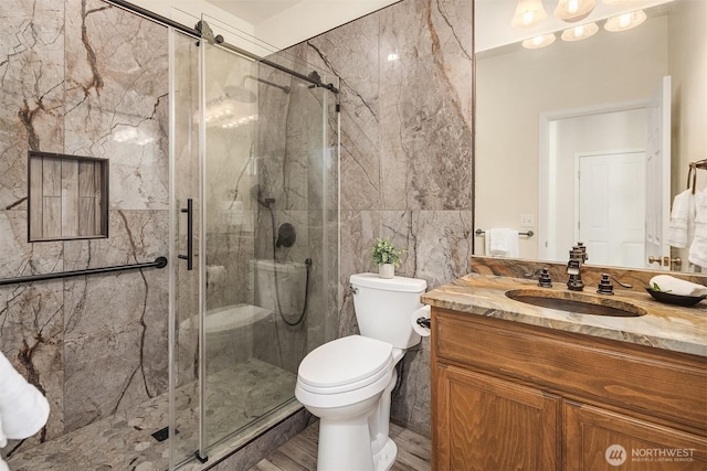 16148 Parkside Way SE, Renton, WA 98058 - full bathroom featuring toilet, vanity, a shower stall, and wood finished floors
