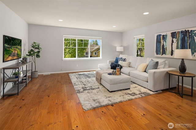 16148 Parkside Way SE, Renton, WA 98058 - living room featuring baseboards, wood finished floors, and recessed lighting