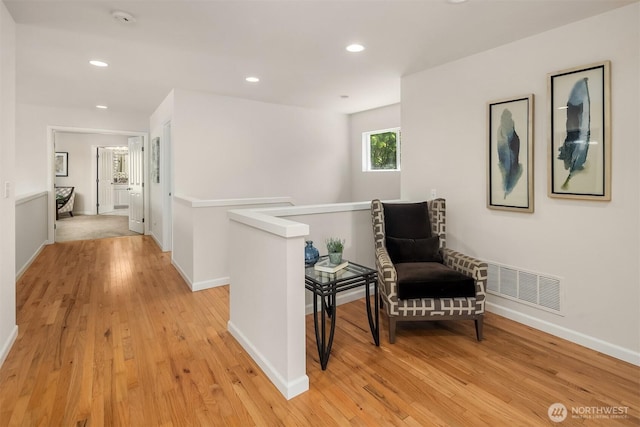 16148 Parkside Way SE, Renton, WA 98058 - hall with light wood-style floors, baseboards, recessed lighting, and an upstairs landing