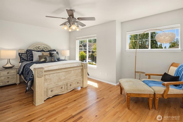 16148 Parkside Way SE, Renton, WA 98058 - bedroom with light wood finished floors, baseboards, and a ceiling fan