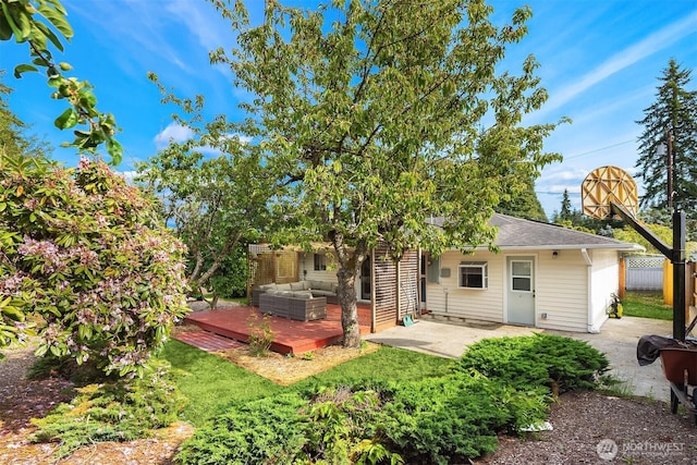 6207 182nd St SW, Lynnwood, WA 98037 - back of house with a deck, an outdoor living space, a patio, and roof with shingles