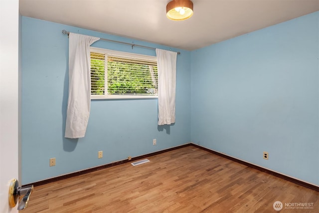 6207 182nd St SW, Lynnwood, WA 98037 - unfurnished room with wood finished floors and baseboards