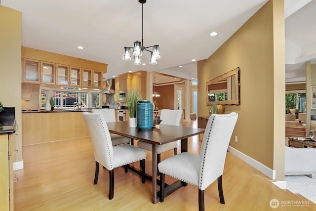 18737 63rd Ave NE, Kenmore, WA 98028 - dining space featuring light wood-style flooring, a chandelier, recessed lighting, and baseboards