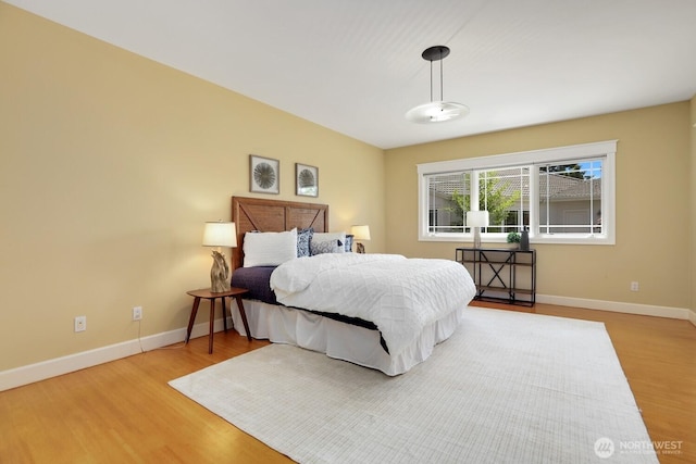 18737 63rd Ave NE, Kenmore, WA 98028 - bedroom with wood finished floors and baseboards