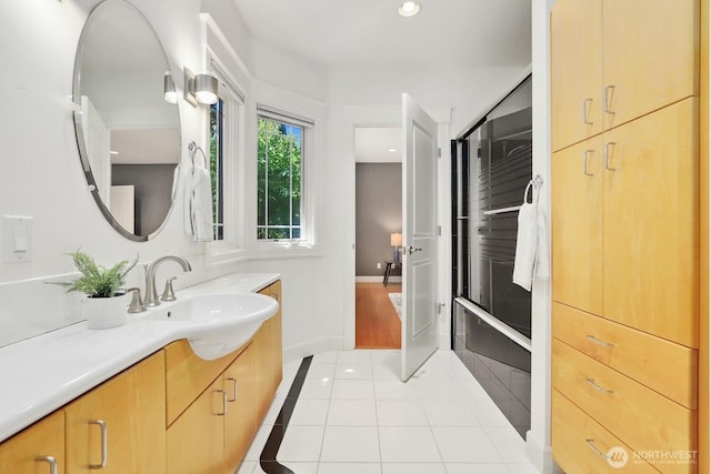 18737 63rd Ave NE, Kenmore, WA 98028 - full bathroom featuring vanity, tile patterned flooring, baseboards, a shower with shower door, and recessed lighting