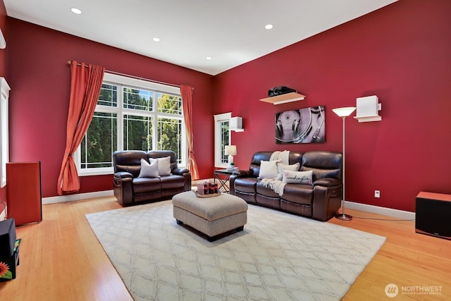 18737 63rd Ave NE, Kenmore, WA 98028 - living room featuring wood finished floors, recessed lighting, and baseboards