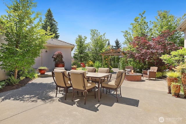 18737 63rd Ave NE, Kenmore, WA 98028 - view of patio featuring an outdoor fire pit and outdoor dining space
