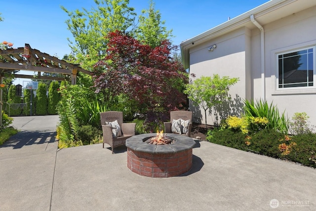 18737 63rd Ave NE, Kenmore, WA 98028 - view of patio with an outdoor fire pit