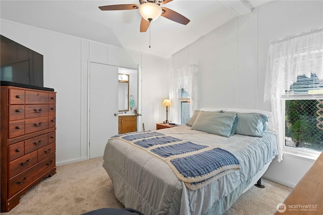 41515 Larson Dr, Gold Bar, WA 98251 - bedroom with lofted ceiling, light carpet, multiple windows, ceiling fan, and ensuite bathroom