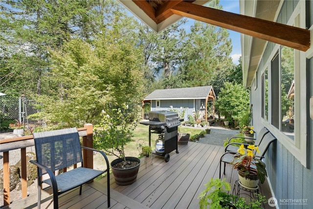 41515 Larson Dr, Gold Bar, WA 98251 - wooden deck featuring grilling area and a storage unit