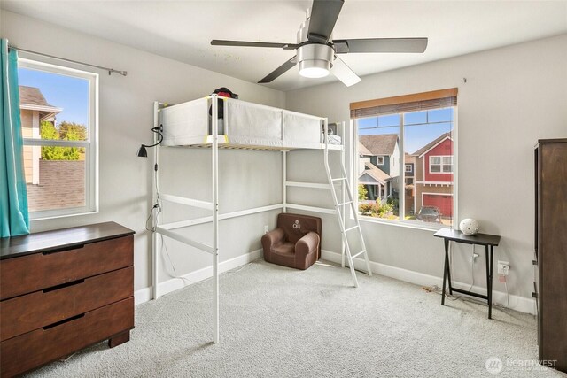 458 SW 111th Pl, Seattle, WA 98146 - bedroom featuring carpet, multiple windows, and baseboards