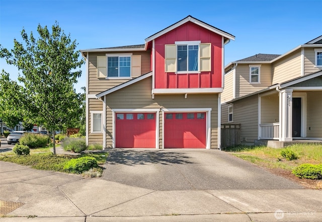 458 SW 111th Pl, Seattle, WA 98146 - view of front facade with an attached garage, board and batten siding, and asphalt driveway