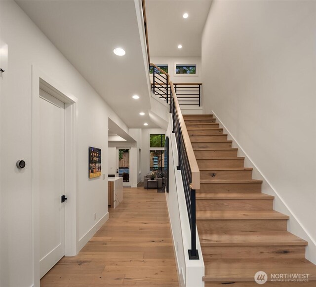 2505 166th Ave SE, Bellevue, WA 98008 - stairs with recessed lighting, wood finished floors, and baseboards