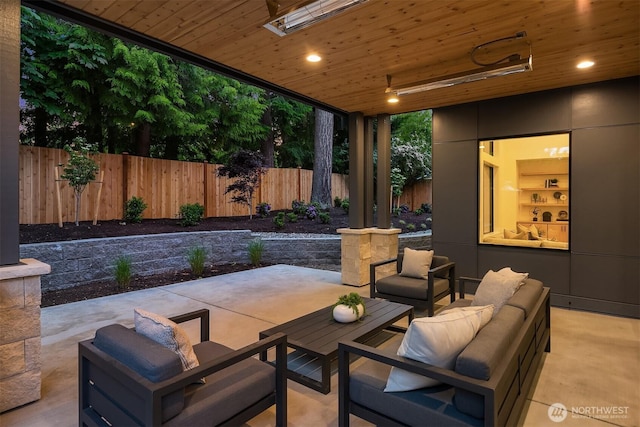 2505 166th Ave SE, Bellevue, WA 98008 - fenced backyard featuring an outdoor hangout area and a patio