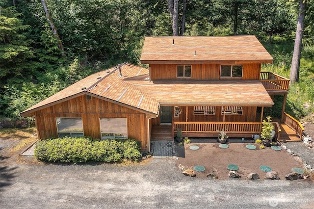 101 Tomihi Dr, Orcas Island, WA 98245 - view of front facade featuring a view of trees and covered porch