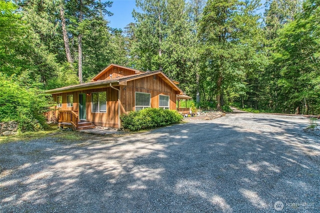 101 Tomihi Dr, Orcas Island, WA 98245 - chalet / cabin featuring a view of trees