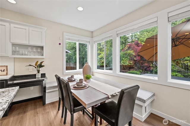 3098 SE 16th St, North Bend, WA 98045 - dining room with wood finished floors, recessed lighting, and baseboards