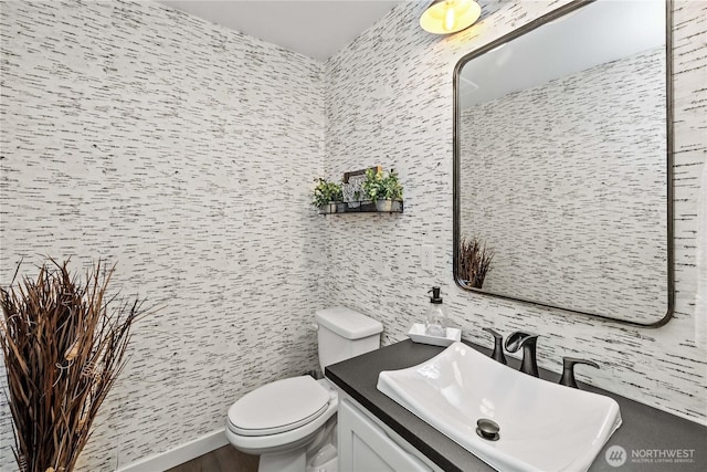 3098 SE 16th St, North Bend, WA 98045 - bathroom featuring toilet, tile walls, and vanity