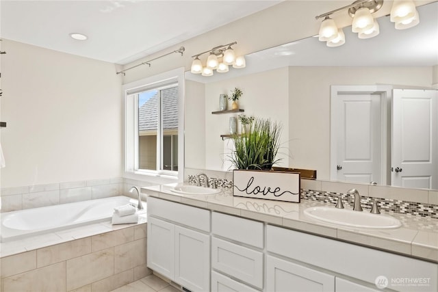 3098 SE 16th St, North Bend, WA 98045 - full bathroom with double vanity, a garden tub, and tile patterned floors