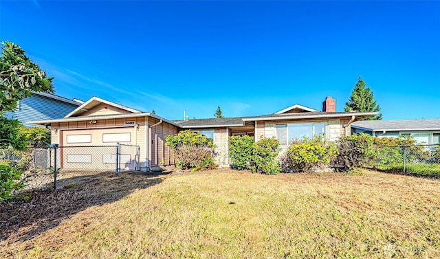 24427 14th Ave S, Des Moines, WA 98198 - ranch-style house with an attached garage, a chimney, and a gate