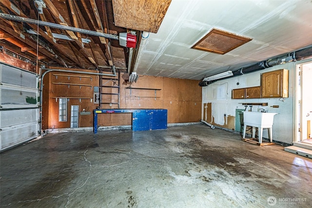 24427 14th Ave S, Des Moines, WA 98198 - garage with a garage door opener and a sink