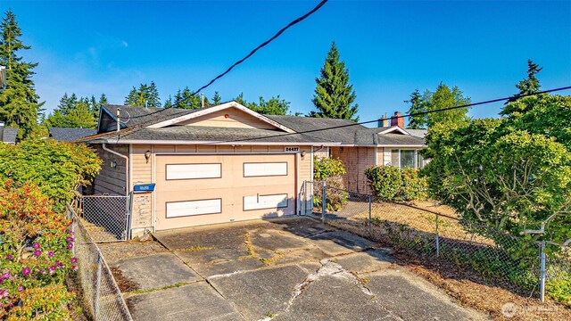 24427 14th Ave S, Des Moines, WA 98198 - view of front of property featuring an attached garage and driveway