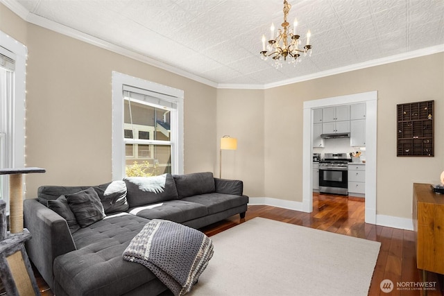 2321 Elm St, Bellingham, WA 98225 - living room featuring a chandelier, dark wood-style floors, baseboards, and crown molding