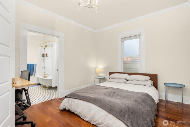 2321 Elm St, Bellingham, WA 98225 - bedroom with hardwood / wood-style floors, crown molding, baseboards, a chandelier, and a desk