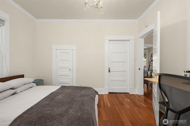2321 Elm St, Bellingham, WA 98225 - bedroom with ornamental molding, wood finished floors, a chandelier, and baseboards
