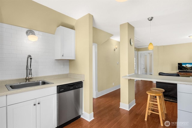 2321 Elm St, Bellingham, WA 98225 - kitchen featuring dishwasher, a sink, tasteful backsplash, white cabinetry, and dark wood-style floors