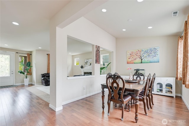 10821 Eastridge Dr NE, Redmond, WA 98053 - dining space with light wood-type flooring, recessed lighting, and baseboards