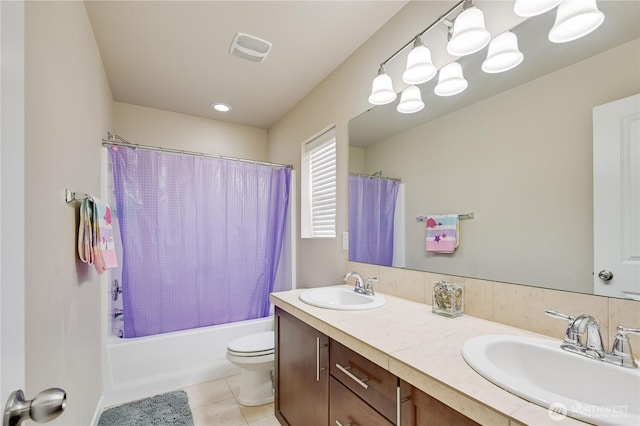 10821 Eastridge Dr NE, Redmond, WA 98053 - full bath featuring double vanity, shower / bath combo with shower curtain, toilet, and tile patterned floors