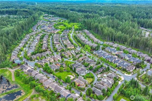 10821 Eastridge Dr NE, Redmond, WA 98053 - aerial view of property and surrounding area with a heavily wooded area and nearby suburban area