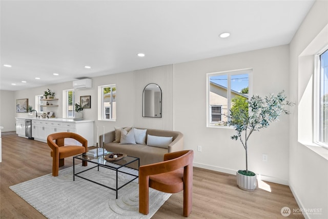 5041 Bowen Pl S, Seattle, WA 98118 - living room with a wall mounted air conditioner, light wood-style floors, baseboards, and recessed lighting