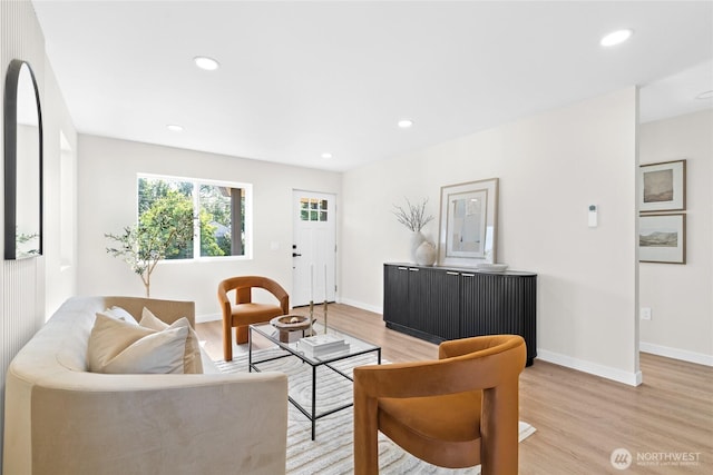 5041 Bowen Pl S, Seattle, WA 98118 - living room with light wood-style floors, recessed lighting, and baseboards